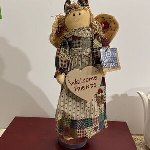Homespun Creations Angel holding Welcome Friends sign. 16”